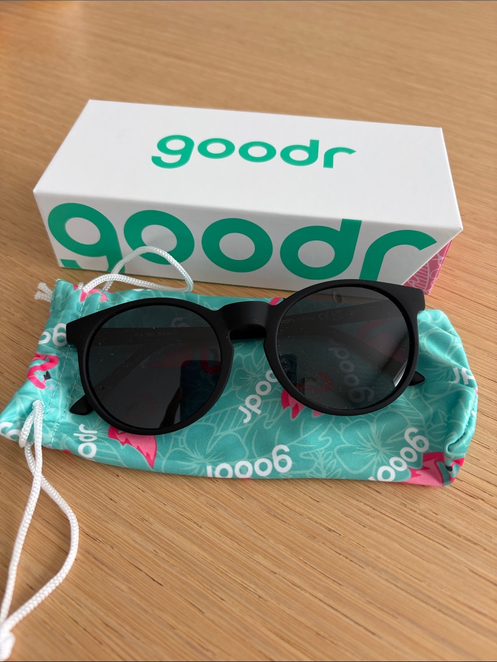 goodr Matte Black Round Sunglasses with Teal Floral Pouch